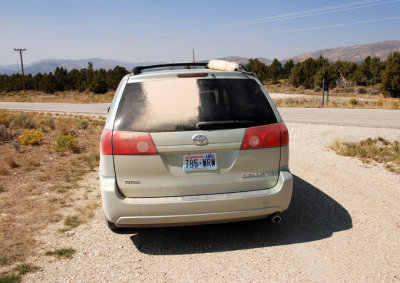 Cleaning road dust from the back window (lambswool duster was the perfect tool)