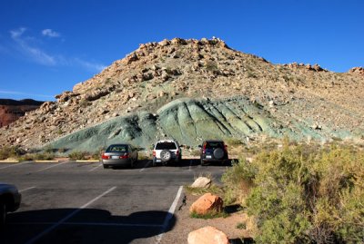 Exposure of the Morrison formation (greenish dirt) at the trailhead