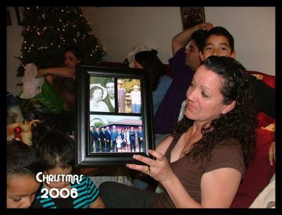 Cousin Cindy with old pictures of Montoya family
