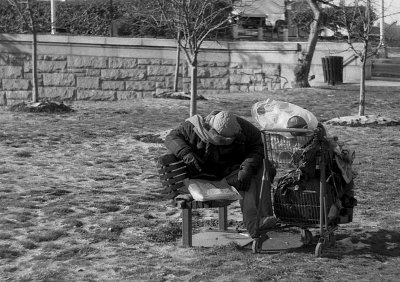 Homeless Man Reading