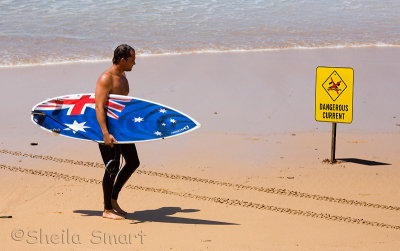 Aussie surfer with Australian flag surfboard
