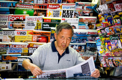 Man in news kiosk