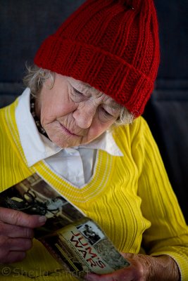 Colourful  elderly lady on ferry