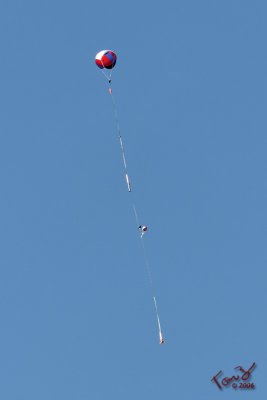 Rocket Floating Down on a Parachute