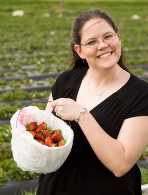 Tabitha picking strawberries.jpg