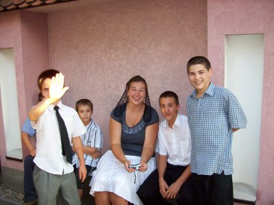 Leah captivates the boys with her camera
