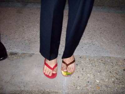 Who can tell me whose feet these are?  Who can tell me whose owns the different sandles?
