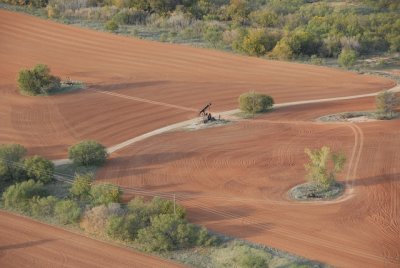 Plowing around steel grasshoppers.
