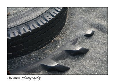 Tyre in the sand.