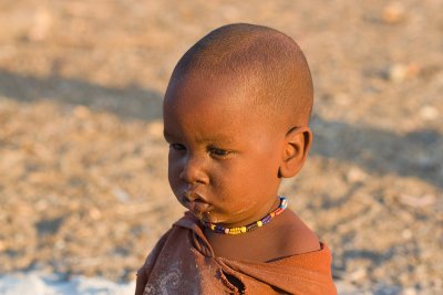 Reflective Himba child portrait.jpg