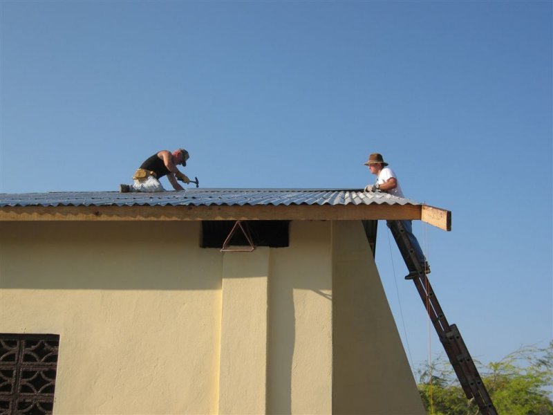 Scotty and Kevin working on the roof again
