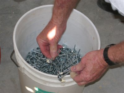 bucket of nails for the tin roof