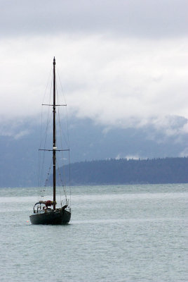 sailboat and lifting clouds