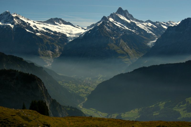 Schreckhorn above the misty Grindelwald valley