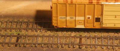 More weathered track with an old car