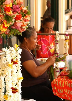 Island Women Making Colorful Leis