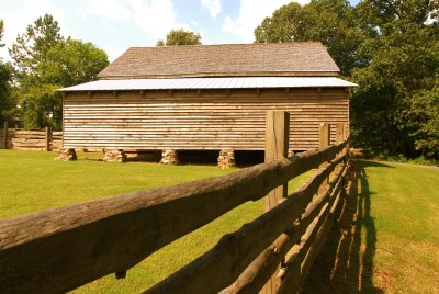 Fence leads to the McDaniel Farm Barn.