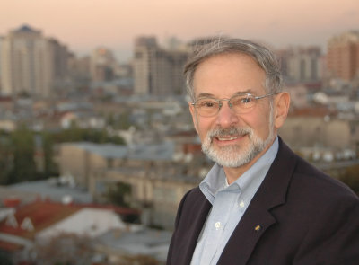 Me on top of the Maidens Tower, with the Baku skyline in the background