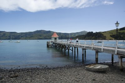 View of the pier and harbor in Akaroa