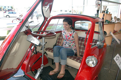Sam trying out a BMW Isetta from the 1950s