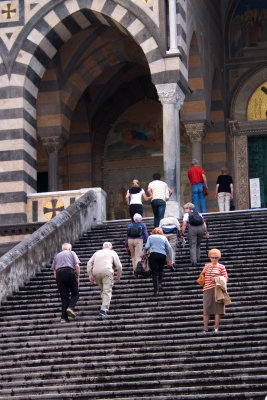 Up the steps of the Duomo