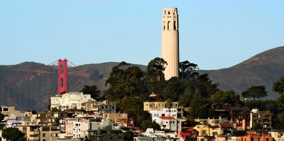 From moving car on Bay Bridge, the Golden Gate and Coit Tower