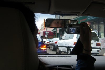 <a href=http://tinyurl.com/ycdum6 target=_blank>Dueling cameras</a>! at stop-light.  Click yellow link.