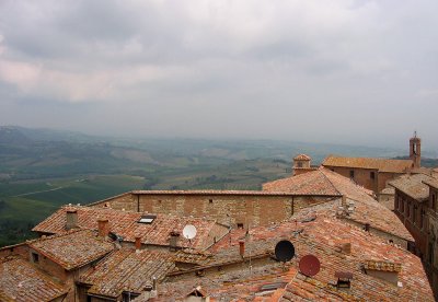Rooftops and Montepulciano landscape from tower