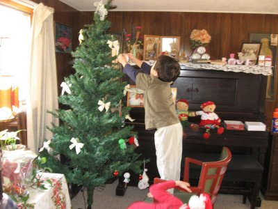 Kyle Starting to Decorate the Christmas Tree