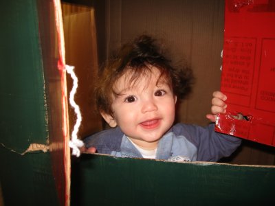 Noah playing in his box house
