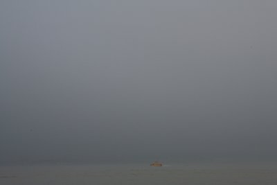 Boat in the fog - New York Harbor