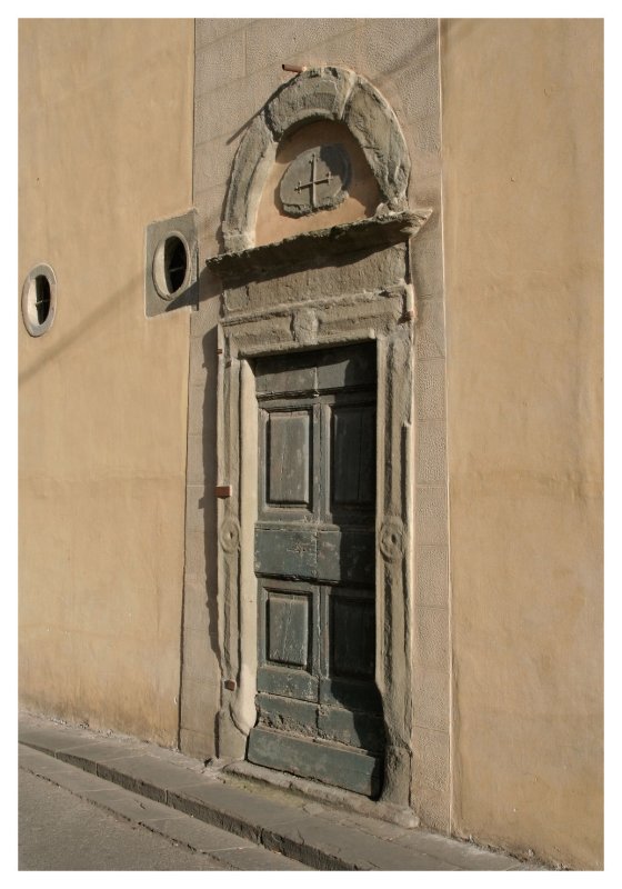 Old door down town Pisa