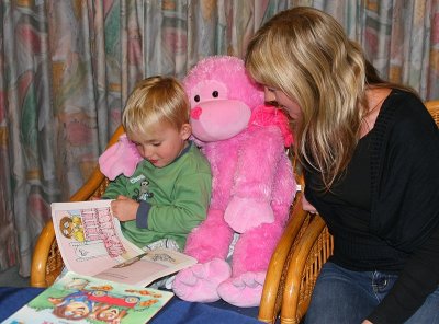 Zach reading a story to Aunti Carli