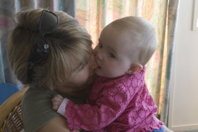 Charli chewing on Mummy's Nose