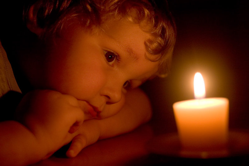S2 pondering a candle