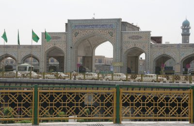  Outside the complex of the shrine of Emam Reza .