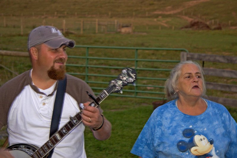 JOHN AND HIS MOM <body oncontextmenu=alert(My photos are protected by copyright laws.); return false;>