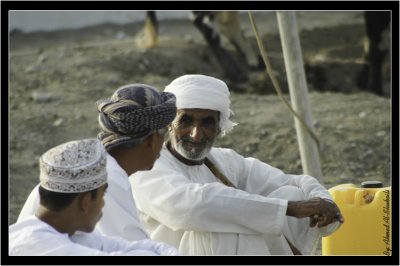 Omani men having a small talk at Sohar Bull fight rink