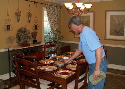 Finishing touches on the Thanksgiving table