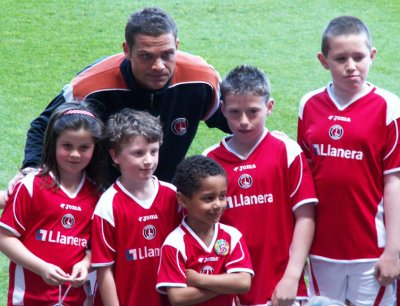 May 7 -- Luke Young Charlton poses with fans