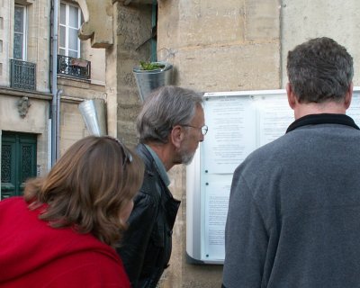 May 17 -  Bayeux- Dick, Jan and John checking out menus for dinner tonight