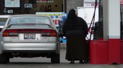 Nun Pumping Gas P1000813.JPG