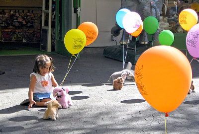 Girl with toy puppies