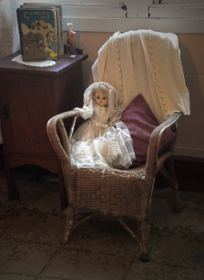 Doll on chair ~