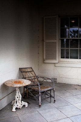 cane chair on the porch