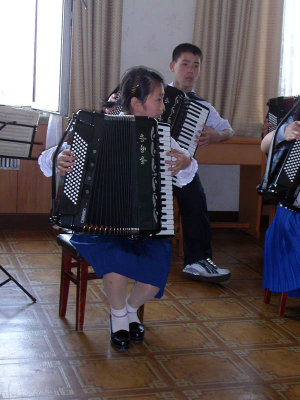 Youth Palace -  Is the accordion bigger than her?