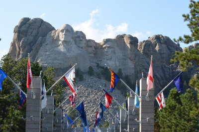 The memorial has a walk of state flags with the date the state was officially part of the country.  