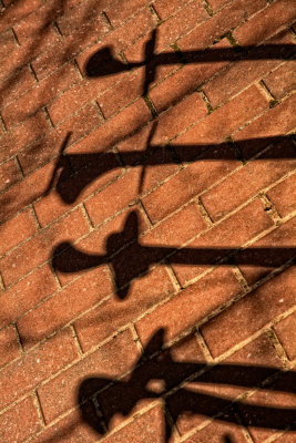 shadows in the sidewalk 01.jpg