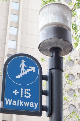 A network of 15+ feet high glass tunnels lets pedestrians walk comfortably in downtown in any weather.