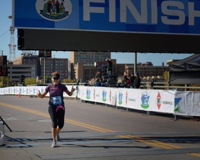 Seionaid Whitefield Finishing the Des Moines Marathon.jpg